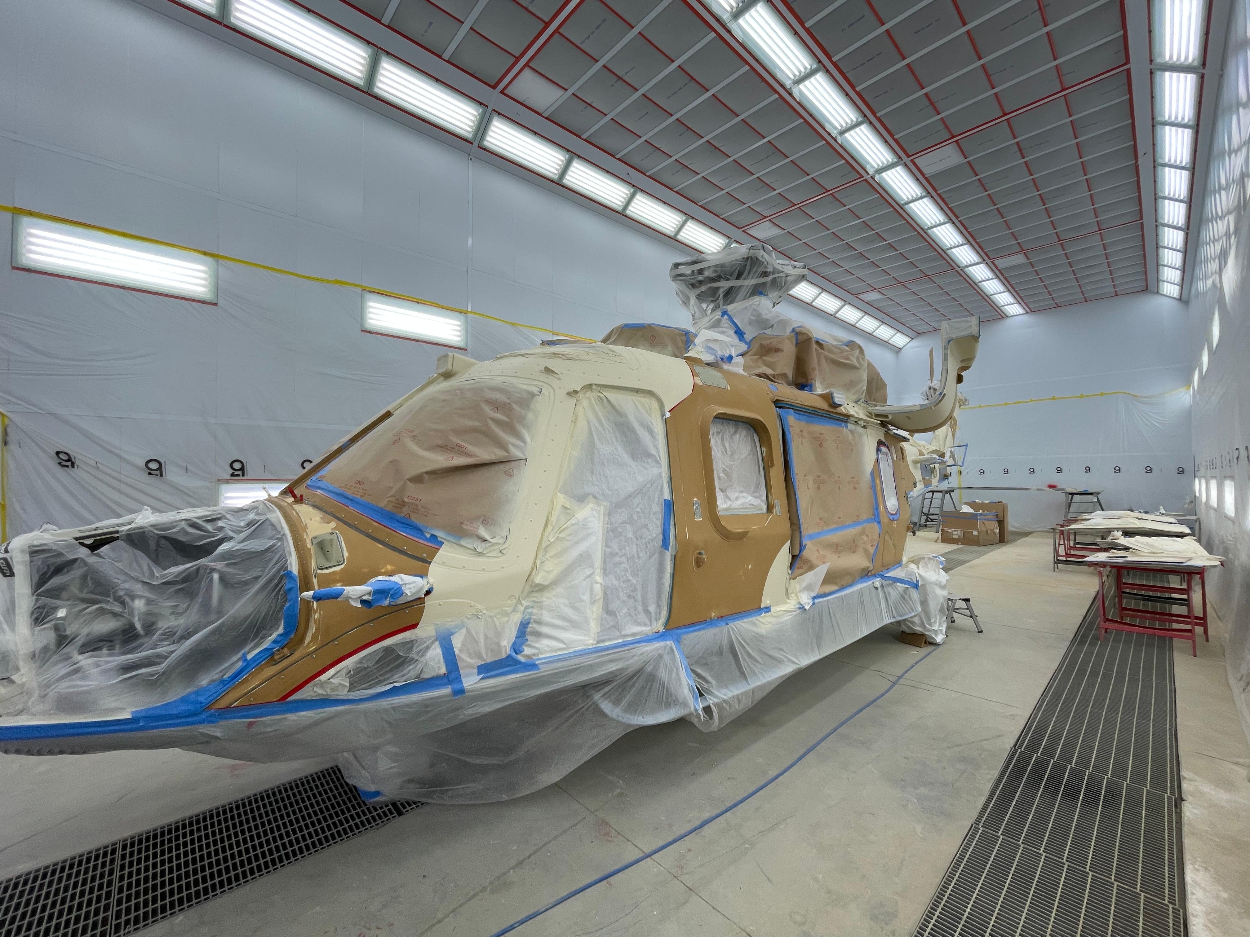 Paint process in dedicated booth