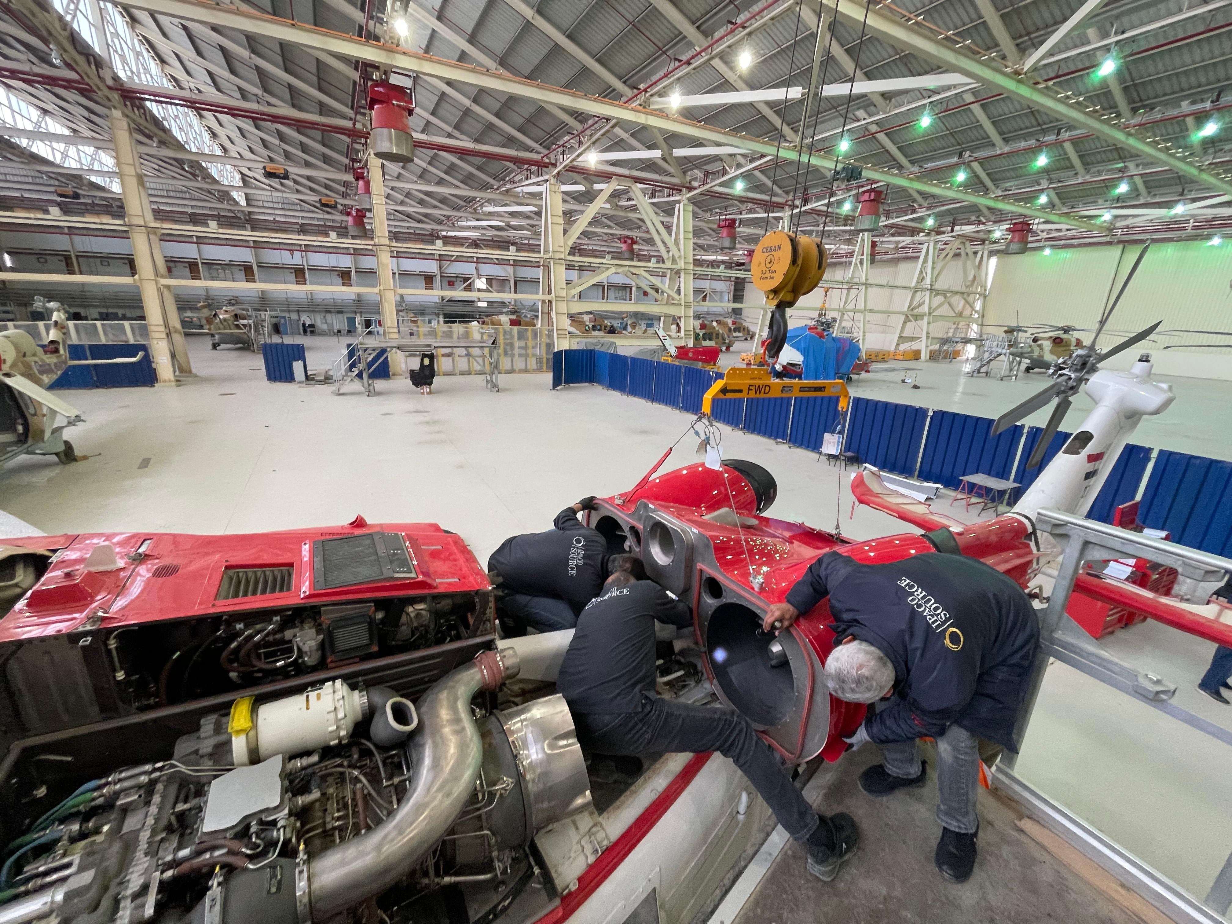 Helicopter upper-deck maintenance with crane support